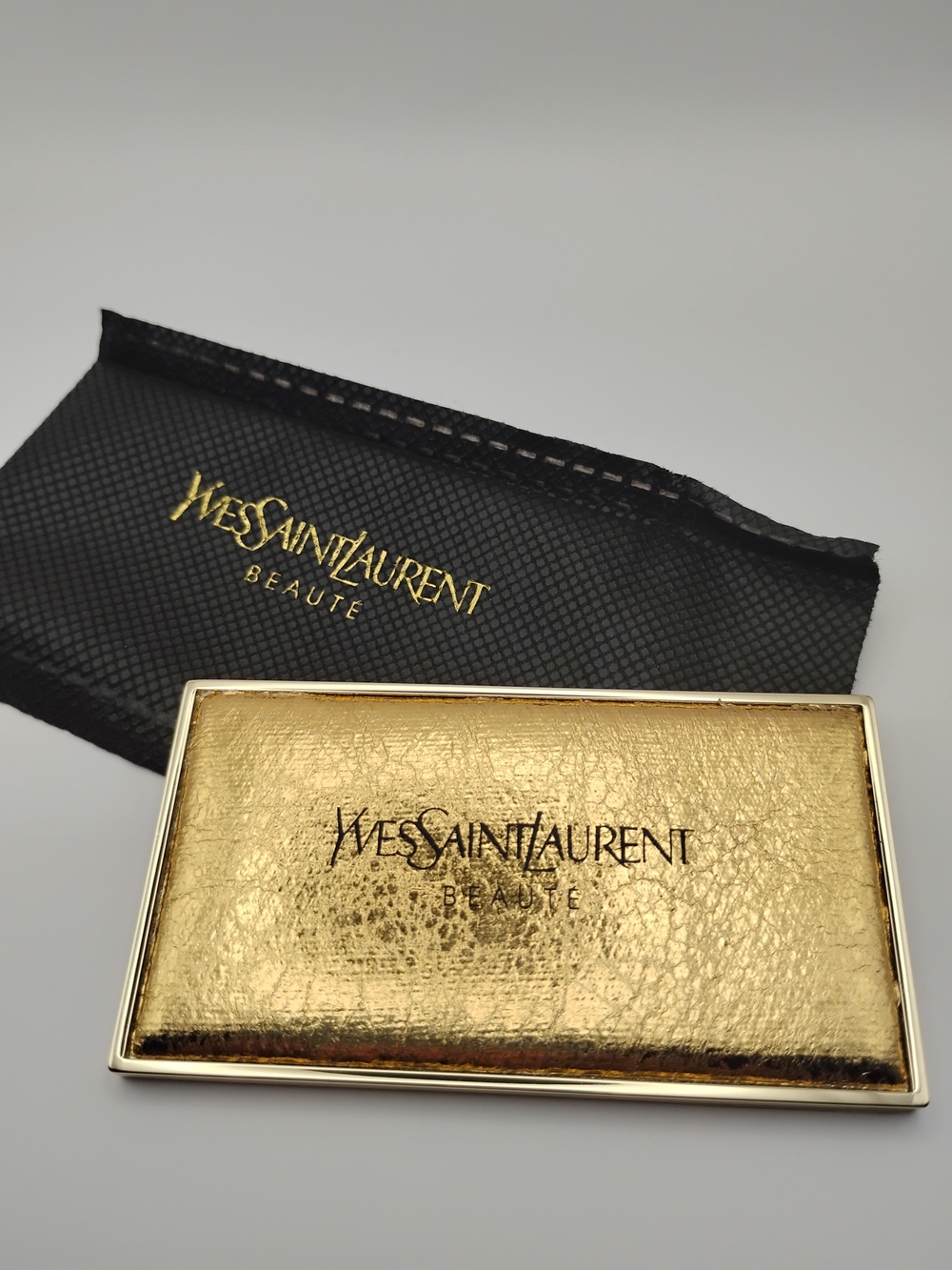 Yves Saint Laurent Gold and Black Mirror